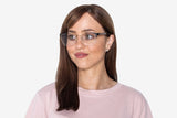Frau trägt Enchanted Gold, Semi Rimless Cat Eye Glasses