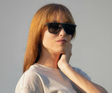 Femme portant les lunettes de soleil Kraywoods Shade, Shade, Black Oversized Square Wooden Sunglasses with Grey polarized lenses - Front Side