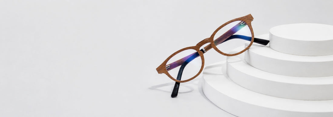 glasses with antireflective lenses sitting on a white surface