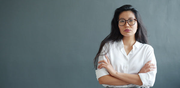 asian women wearing low bridge glasses design on a blue background