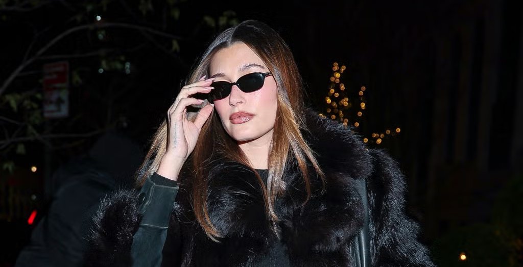 Celebrity Hailey bieber wearing black sunglasses