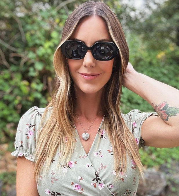 Woman wearing Kraywoods Mia sunglasses, geometric acetate sunglasses