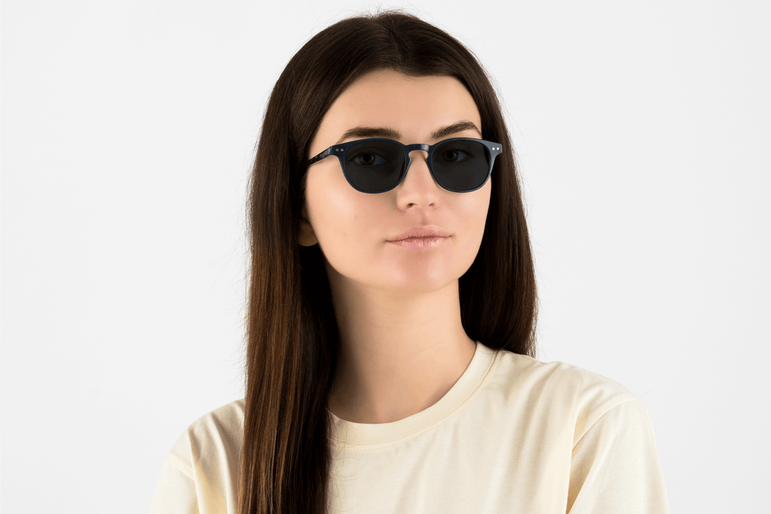 Woman wearing Dash Navy, Retro Square Navy Blue Acetate Glasses – front view