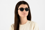 Woman wearing Dash Navy, Retro Square Navy Blue Acetate Glasses – front view