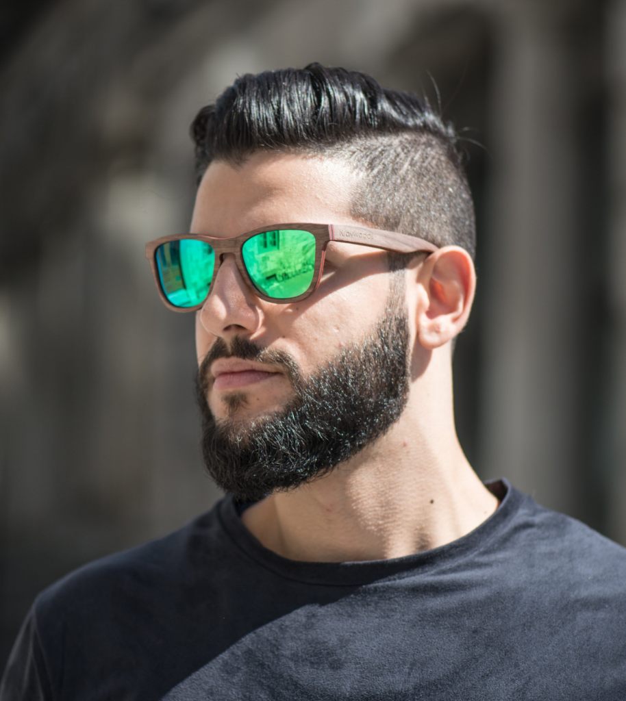 Man wearing wood sunglasses