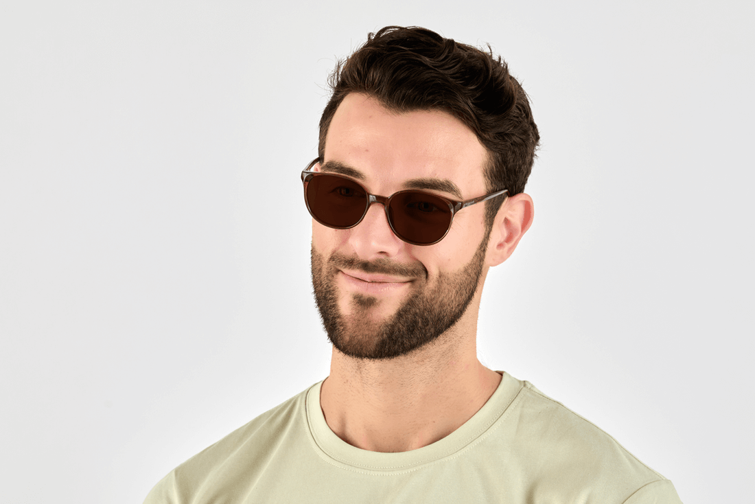 Man wearing Serene Brown, Oval Brown Acetate Glasses – side view