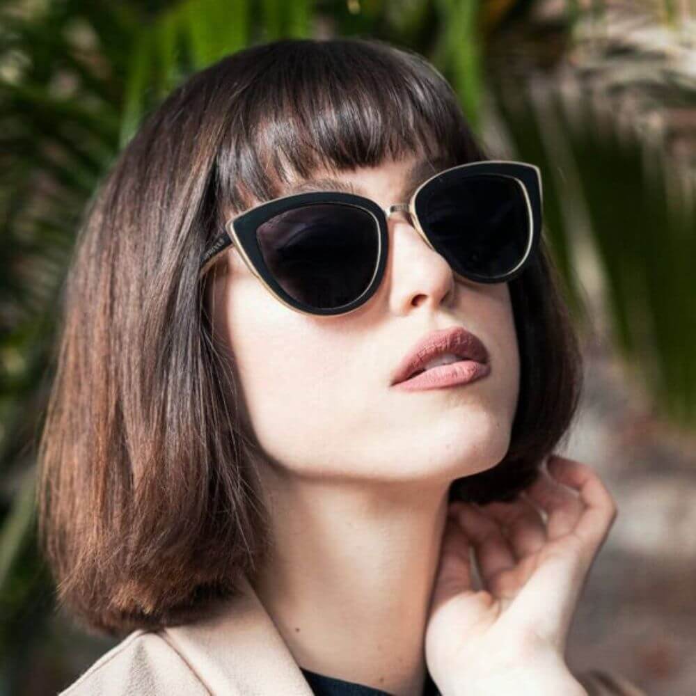 Woman wearing cat eye sunglasses