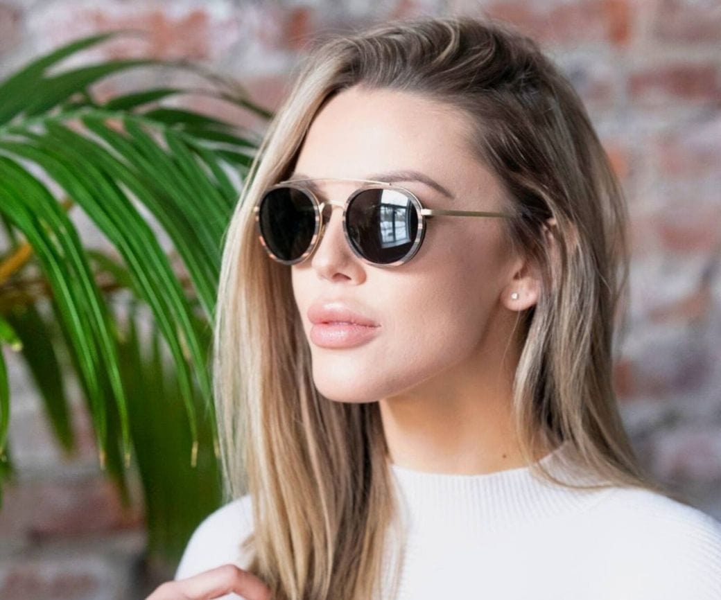 Woman wearing Kraywoods Aspen Gold, Gold Round Sunglasses made with Ebony wood and 100% UV Protection, Polarized Lenses