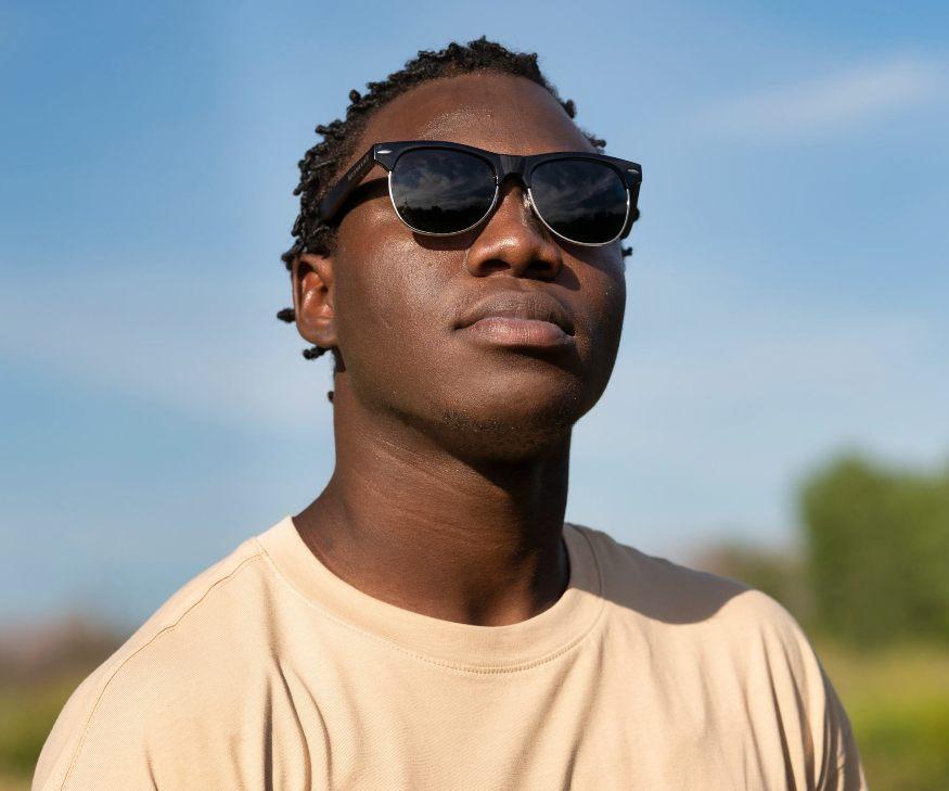 Man wearing Kraywoods Black Jaguar, Browline Sunglasses Featuring Ebony Wood Arms with 100% UV Protection, Polarized Lenses