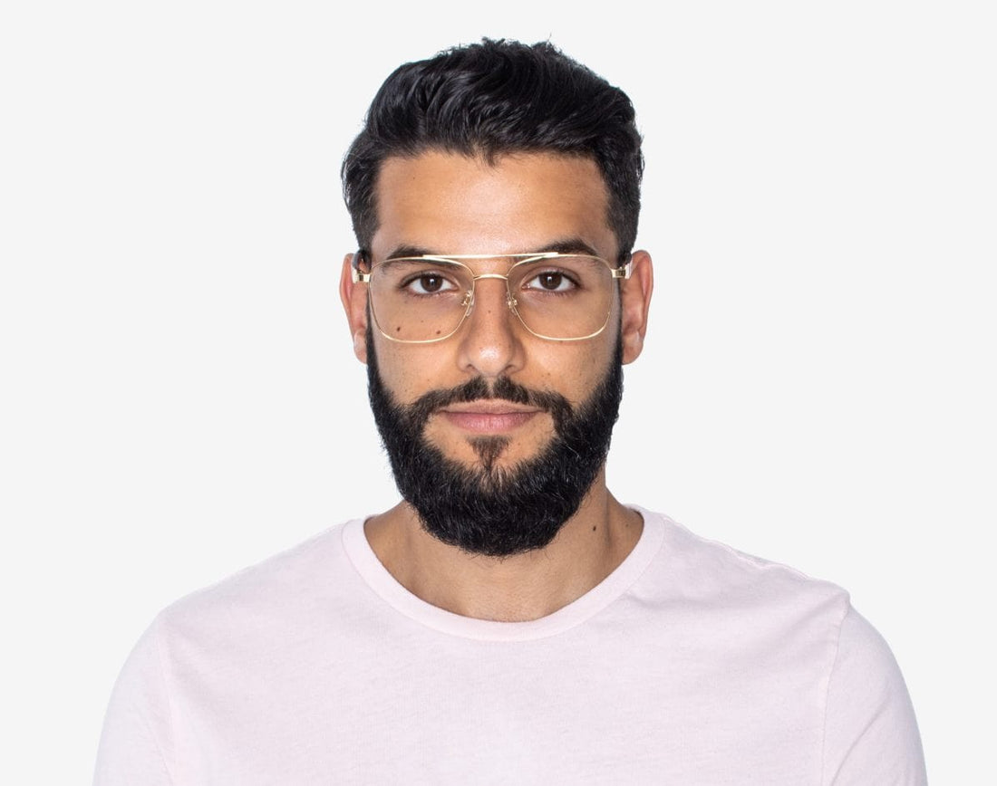 Man wearing Drive Gold - Retro Square Eyeglasses in Gold Metal