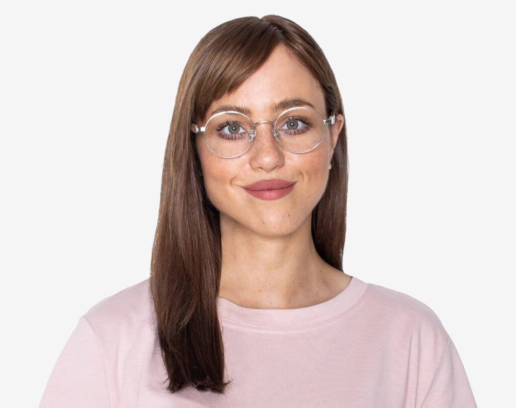 Woman wearing Joy Silver - Round Eyeglasses in Silver Metal