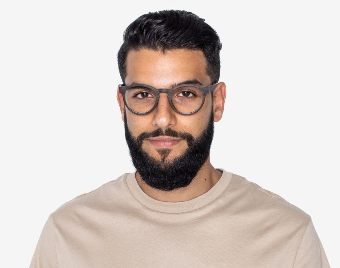 Man wearing Cheer Black - Retro Round Eyeglasses made from Oak Wood