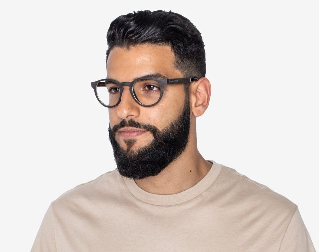 Man wearing Cheer Black - Retro Round Eyeglasses made from Oak Wood