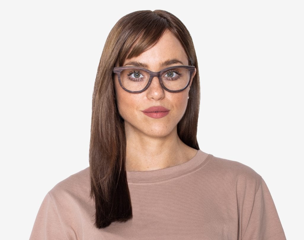 Woman wearing Charm Purple - Cat-Eye Eyeglasses made from Sandal Wood