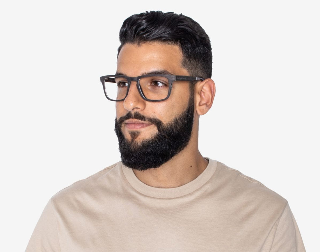Man wearing Bold Black - Rectangle Eyeglasses made from Oak Wood