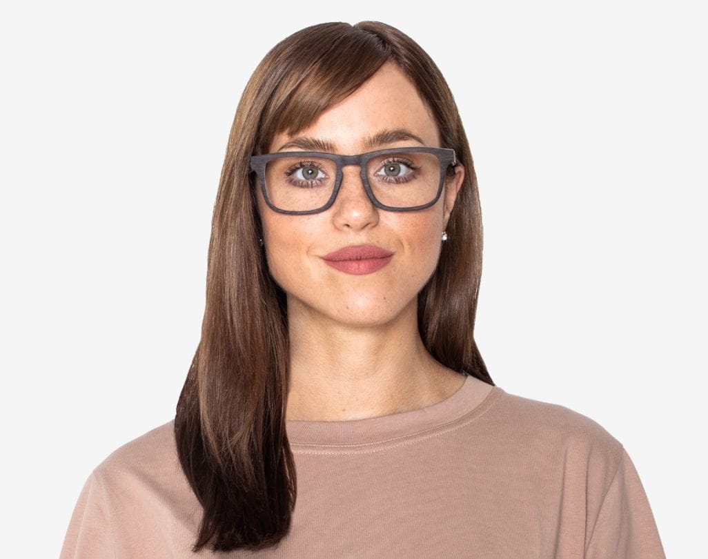 Woman wearing Bold Black - Rectangle Eyeglasses made from Oak Wood