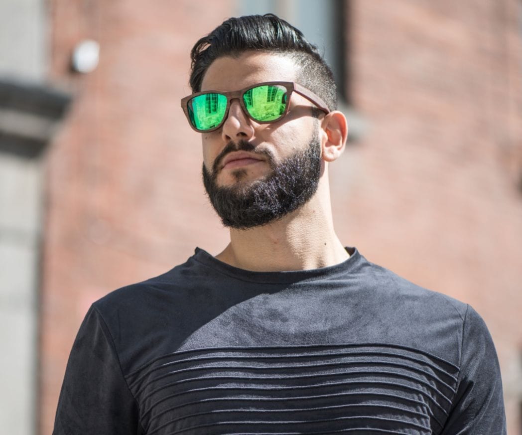 Man wearing Kraywoods Racer, Green Mirror Sunglasses with Square Walnut Wood Frame and 100% UV Protection, Polarized Lenses