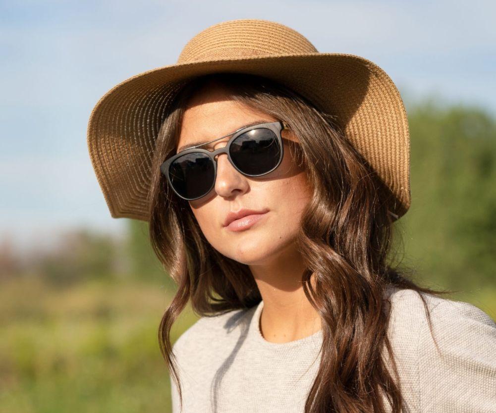 Woman wearing Kraywoods Sienna, Dsquared Sunglasses with double-bridge Featuring Bamboo Arms and 100% UV Protection Lenses