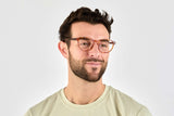 Hombre con gafas ovaladas naranja esperanza, naranja tortuga