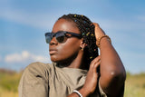 Wanita memakai Black Jaguar, Black Browline Sunglasses