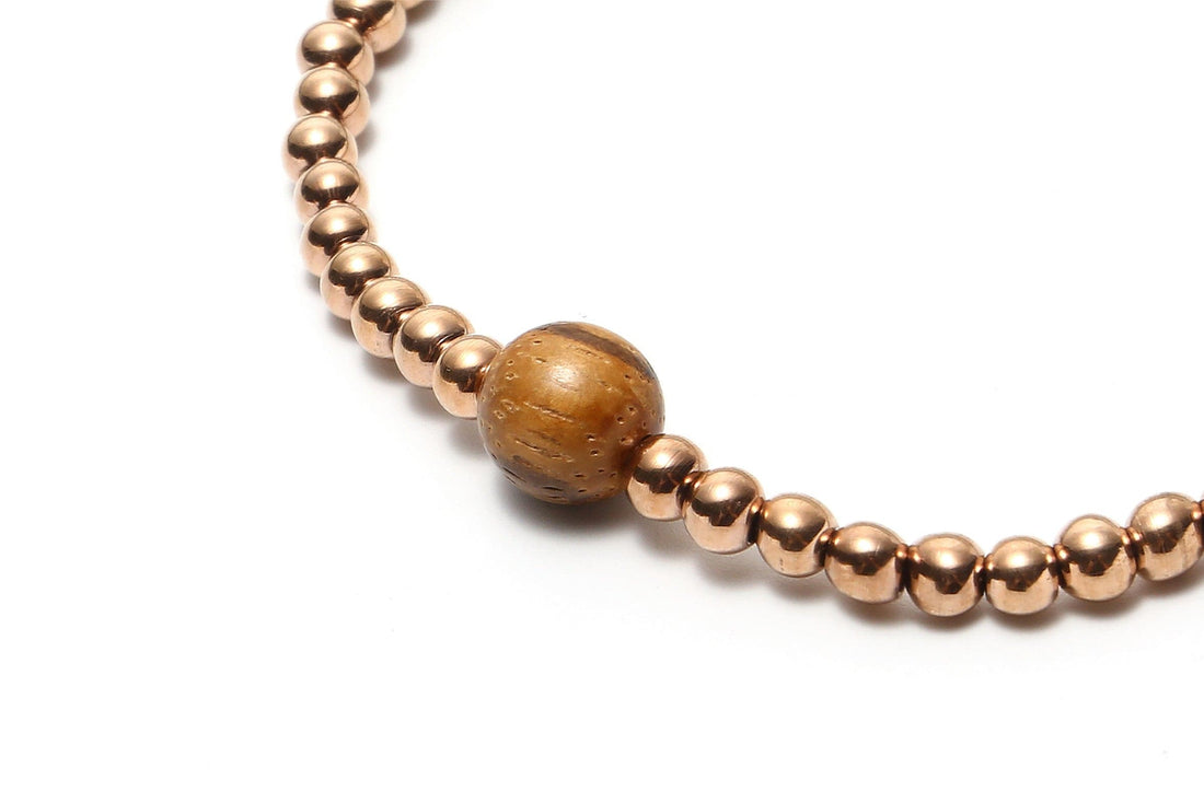Roségouden kralenarmband Macrame
